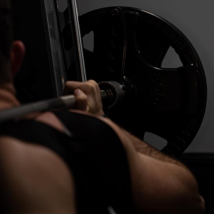 Professional gym interior with strength equipment